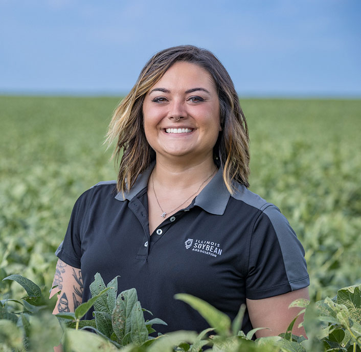 Illinois Soybean Association member Heather Rod in a soybean field