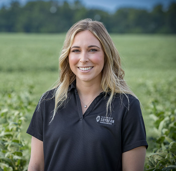 Illinois Soybean Association member Claire Weinzierl in a soybean field